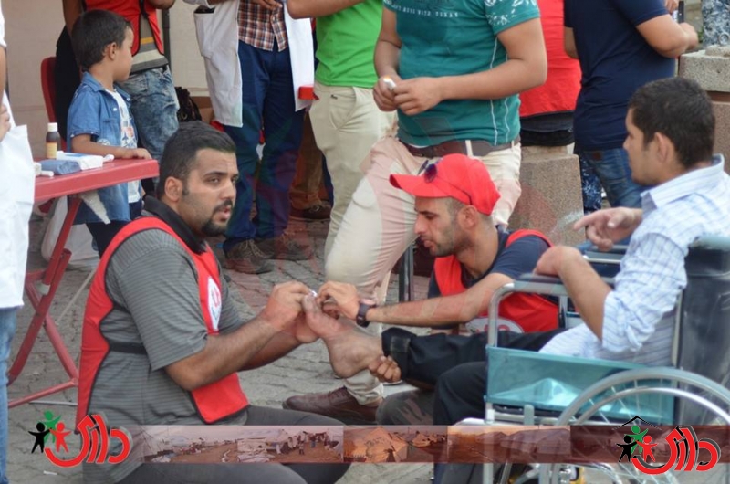 منظمة داري مستمرة بإسعاف المتظاهرين بساحة التحرير رغم منعها أمنيا